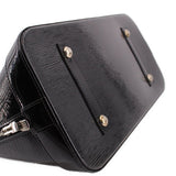 Louis Vuitton Alma GM handbag, close view of textured base and metal feet