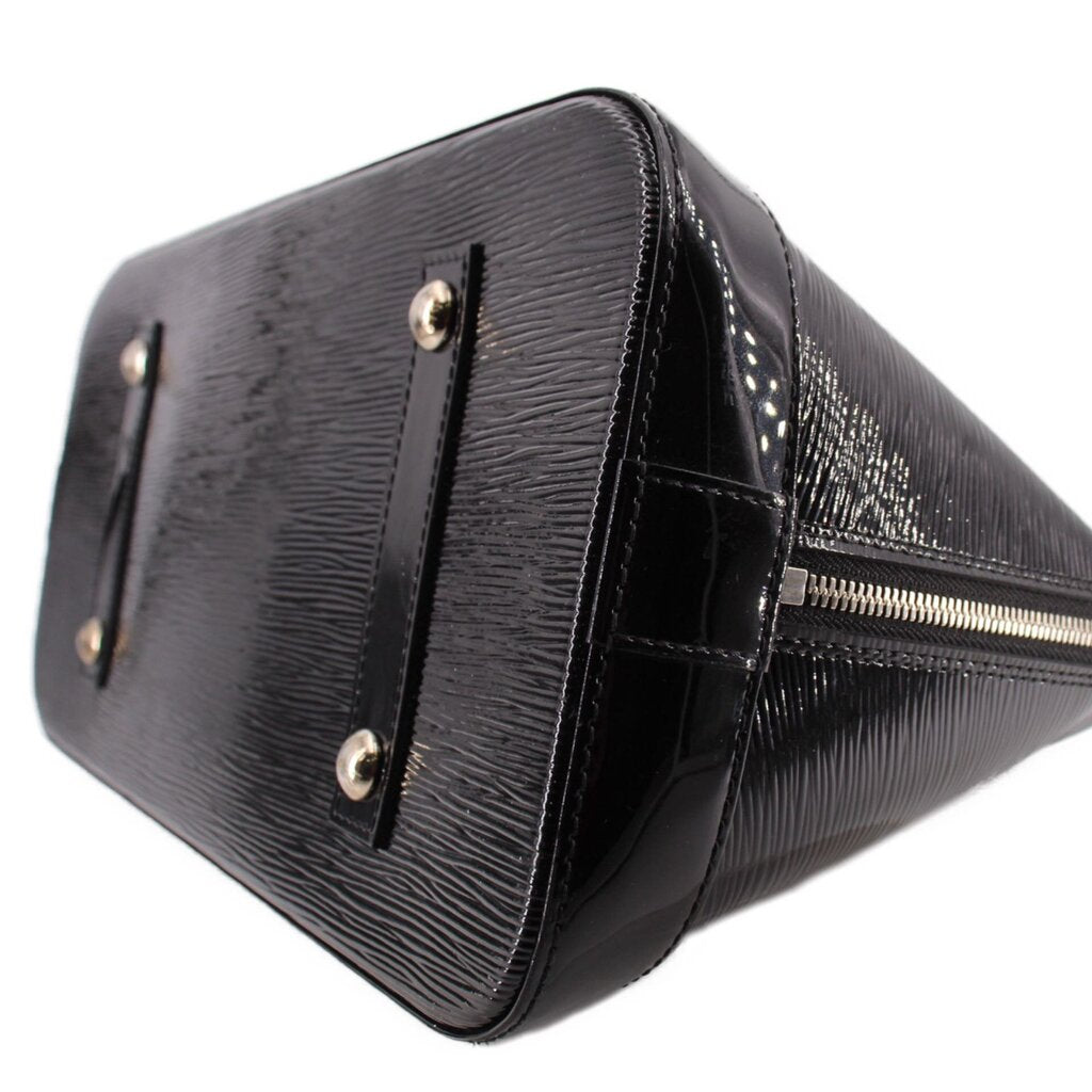 Louis Vuitton Alma GM handbag, angled underside showing base feet and side zipper