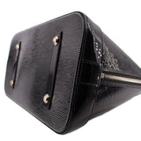 Louis Vuitton Alma GM handbag, angled underside showing base feet and side zipper