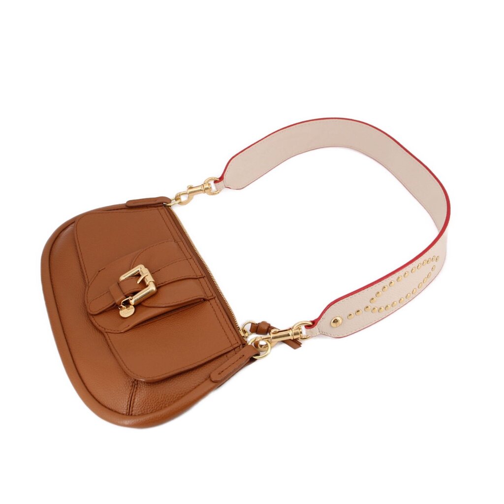 Brown shoulder bag with cream studded strap, chain link, and buckle detail