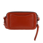 Rust leather snapshot camera bag back with rectangular patch and top zipper