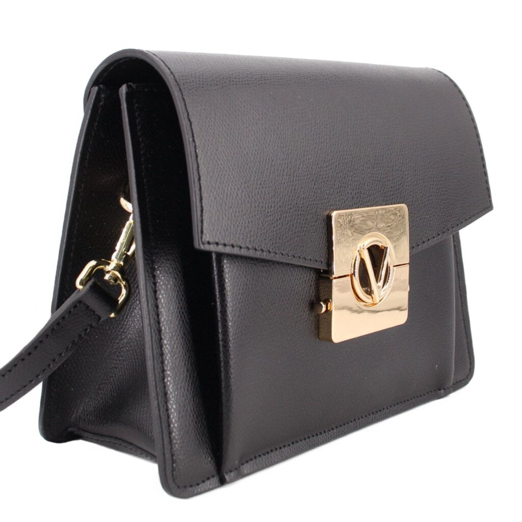 Black crossbody bag with flap closure and gold square logo clasp