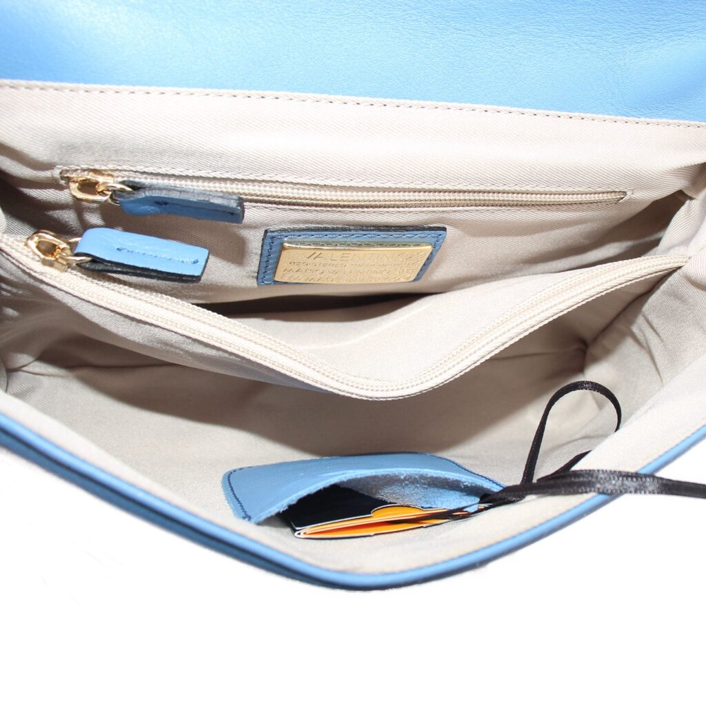 Blue bag interior with top zip pocket and card slots