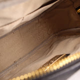Crossbody bag interior lining with zip pocket and gold-tone zipper pull