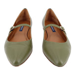 Pair of green pointed-toe leather flats with buckle straps and tan insoles