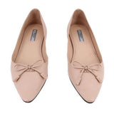 Pair of PRADA nude Saffiano flats with pointed toes and bow details