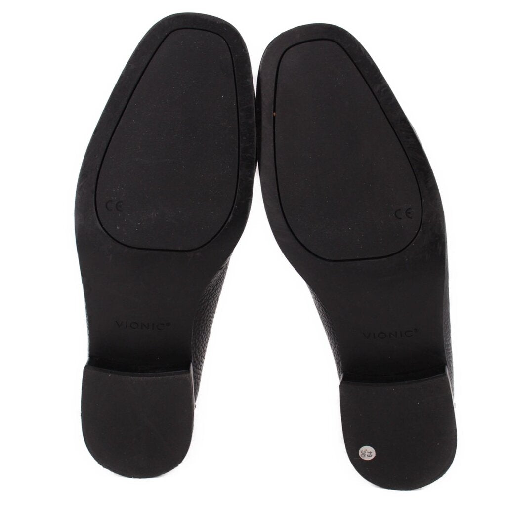 Pair of VIONIC loafers shown sole-up with black outsoles and low heels