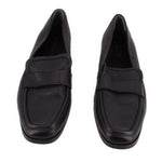 Pair of VIONIC black leather loafers viewed from the front