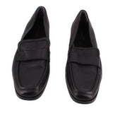 Pair of VIONIC black leather loafers viewed from the front