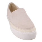UGG cream suede slip-on flat with a perforated trim and thick white sole