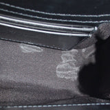 Close-up of the bag's dark fabric lining and interior zipper pocket