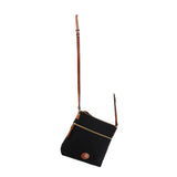 Dooney & Bourke black nylon crossbody bag with its long adjustable brown strap extended