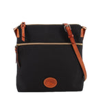 Dooney & Bourke black nylon crossbody bag with brown trim, front zip pocket, and logo patch
