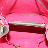 Bucket bag interior with bright red lining and zip pocket