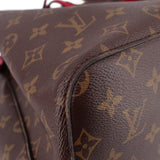 Close-up of monogram canvas and stitched corner on the bucket bag