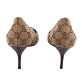 Pair of GUCCI brown GG monogram pumps showing the heel backs and slim heels