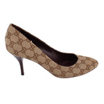 GUCCI brown GG monogram pump in side profile with a slim heel