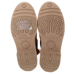 Pair of booties with tan rubber soles featuring deep patterned treads