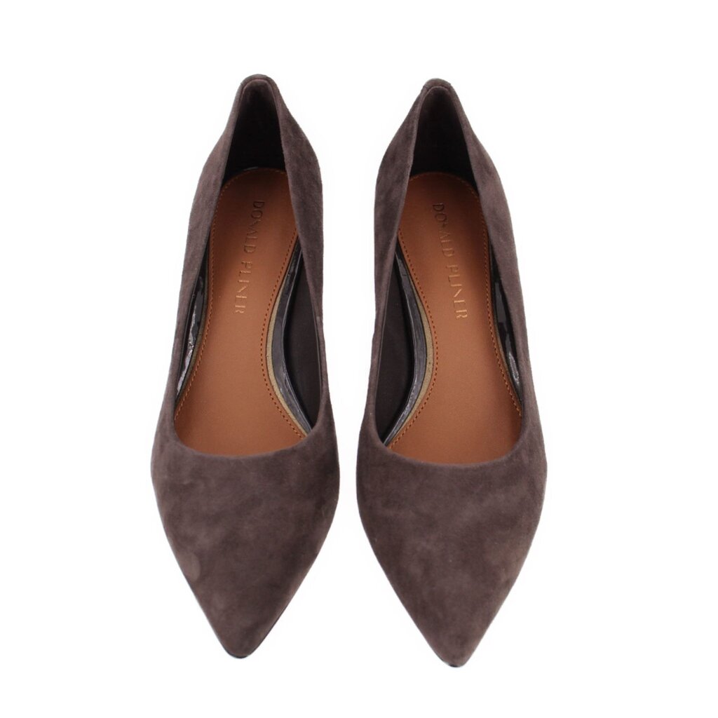 Pair of brown suede pumps with pointed toes, shown from above