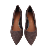 Pair of brown suede pumps with pointed toes, shown from above