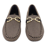 Pair of Rothy's black and cream checkered loafers with gold-tone bit hardware