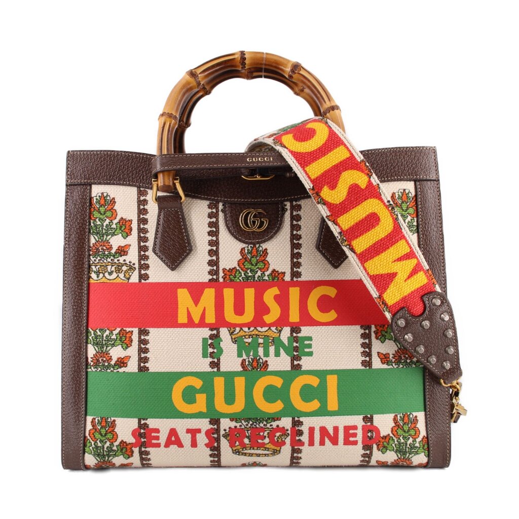 GUCCI Diana Centennial tote with bamboo handles, floral tapestry, and colorful slogan bands