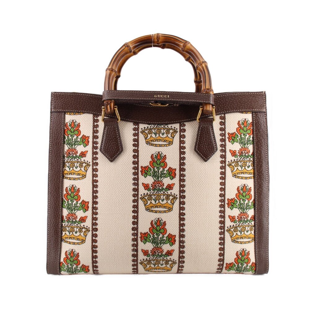 GUCCI tote with cream floral tapestry panels, brown leather trim, and bamboo handles