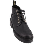 CHANEL black leather platform ankle boot with lace-up front, metal eyelets, and logo toe