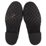 CHANEL black boot soles with diamond-pattern tread and block heels