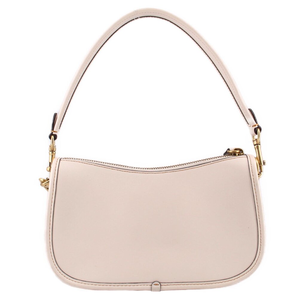 Back of the cream COACH Swinger bag with a smooth leather panel