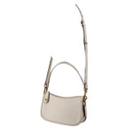Cream COACH Swinger bag with its long adjustable crossbody strap extended