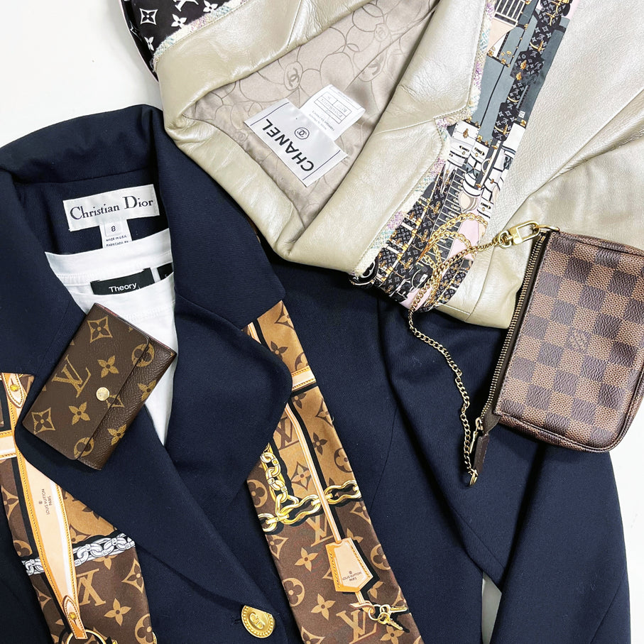 Navy Dior blazer with Louis Vuitton scarf and wallet, Chanel blazer with Louis vuitton scarf and pouch.
